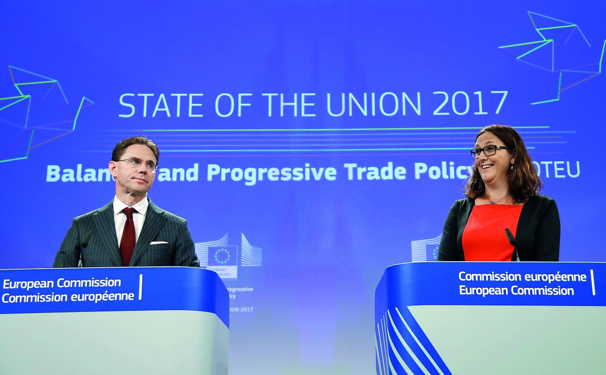 European Commission Vice-President Jyrki Katainen (left) and European Trade Commissioner Cecilia Malmstrom address a joint news conference on the trade package in Brussels, Belgium.