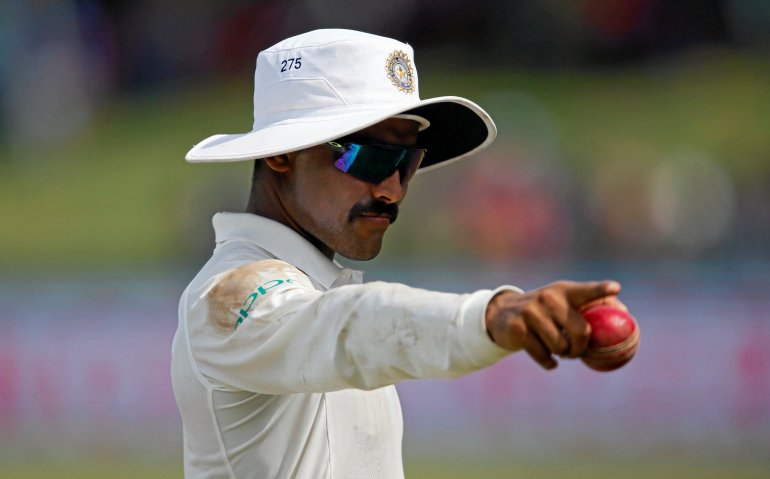 India's Ravindra Jadeja shows a ball as he gestures at fans. REUTERS/Dinuka Liyanawatte/file photo