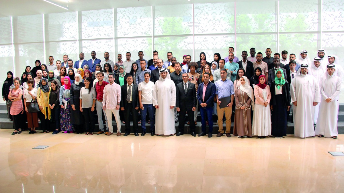 The staff, students and other officials of the Doha Institute of Graduate Studies (DI) during the event. 