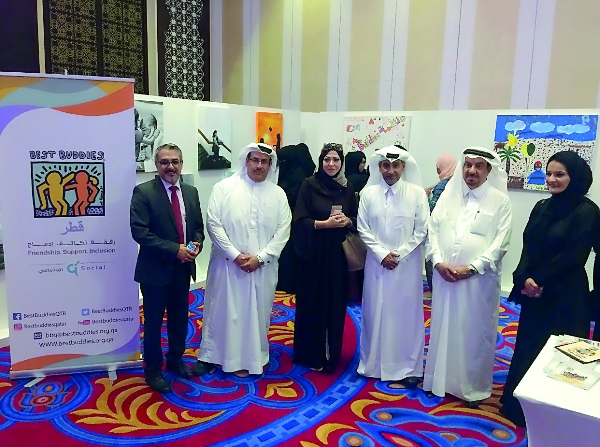Artists with the officials of Best Buddies Qatar. 
