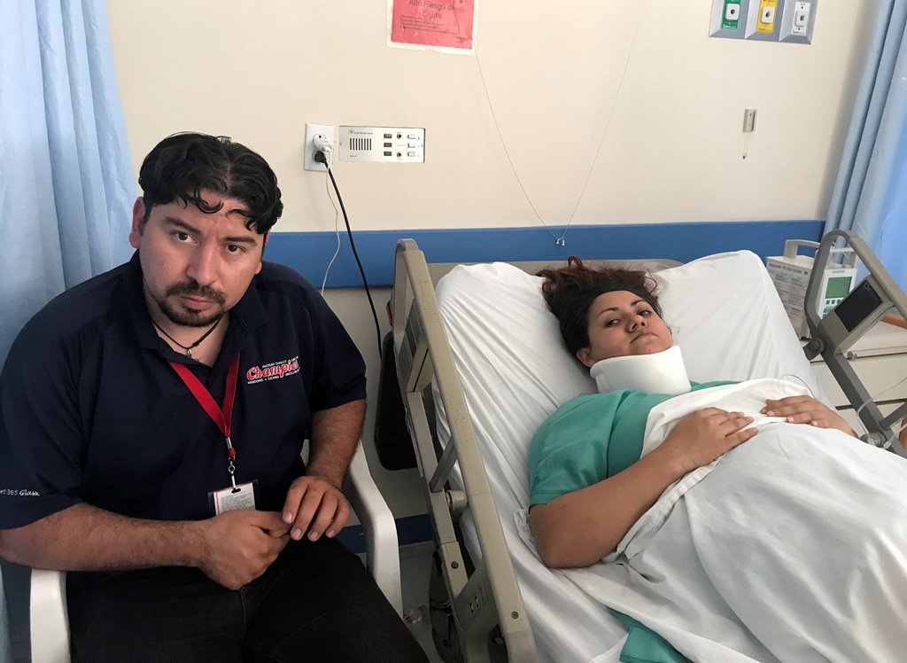 Diana Pacheco (R) rests in a hospital bed, next to her husband Juan Jesus Garcia, after she was rescued from a collapsed office building, after an earthquake in Mexico City, Mexico September 22, 2017. REUTERS/Anthony Esposito