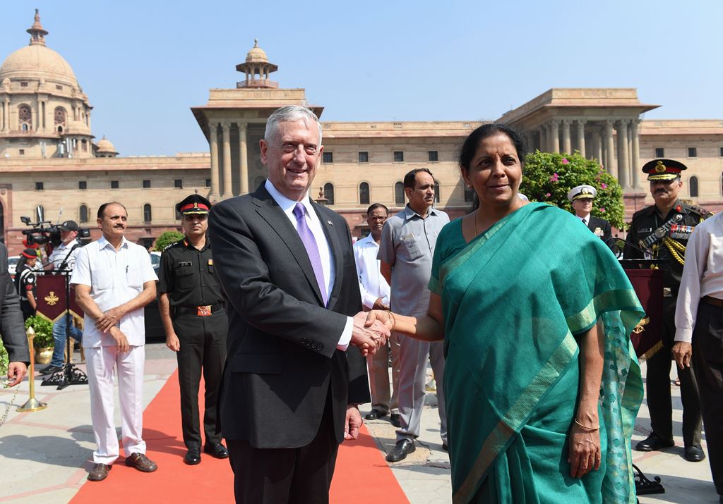 US Defence Secretary Jim Mattis (L) shakes hands with Indian Defence Minister Nirmala Sitharaman at the Indian Ministry of Defence prior to a meeting in New Delhi on September 26, 2017. AFP / PRAKASH SINGH