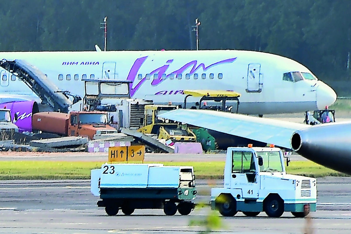 A VIM-AVIA plane is seen parked at Moscow's Domodedovo airport on September 26, 2017. Tens of thousands of passengers were stranded on September 26, 2017 as the Russian private airline said it could no longer operate without state help and tour operators 