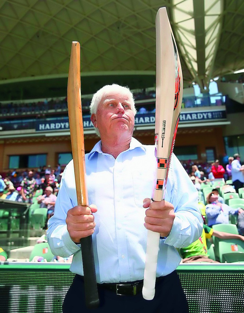 Former South African Batsman Barry Richards poses with the bat he made 325 in a single day at the Adelaide Oval and with the bat of David Warner of Australia during day one of the third Test match between Australia and New Zealand at Adelaide Oval in Adel