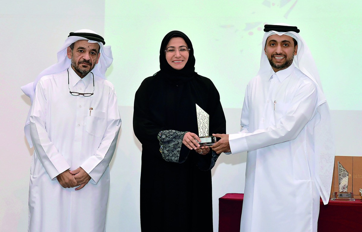 FROM LEFT: QU Vice-President for Academic Affairs, Dr Omar Al Ansari; Prof Maha Khalil Al Hendawi and QU President Dr Hassan Al Derham at the annual convocation yesterday.