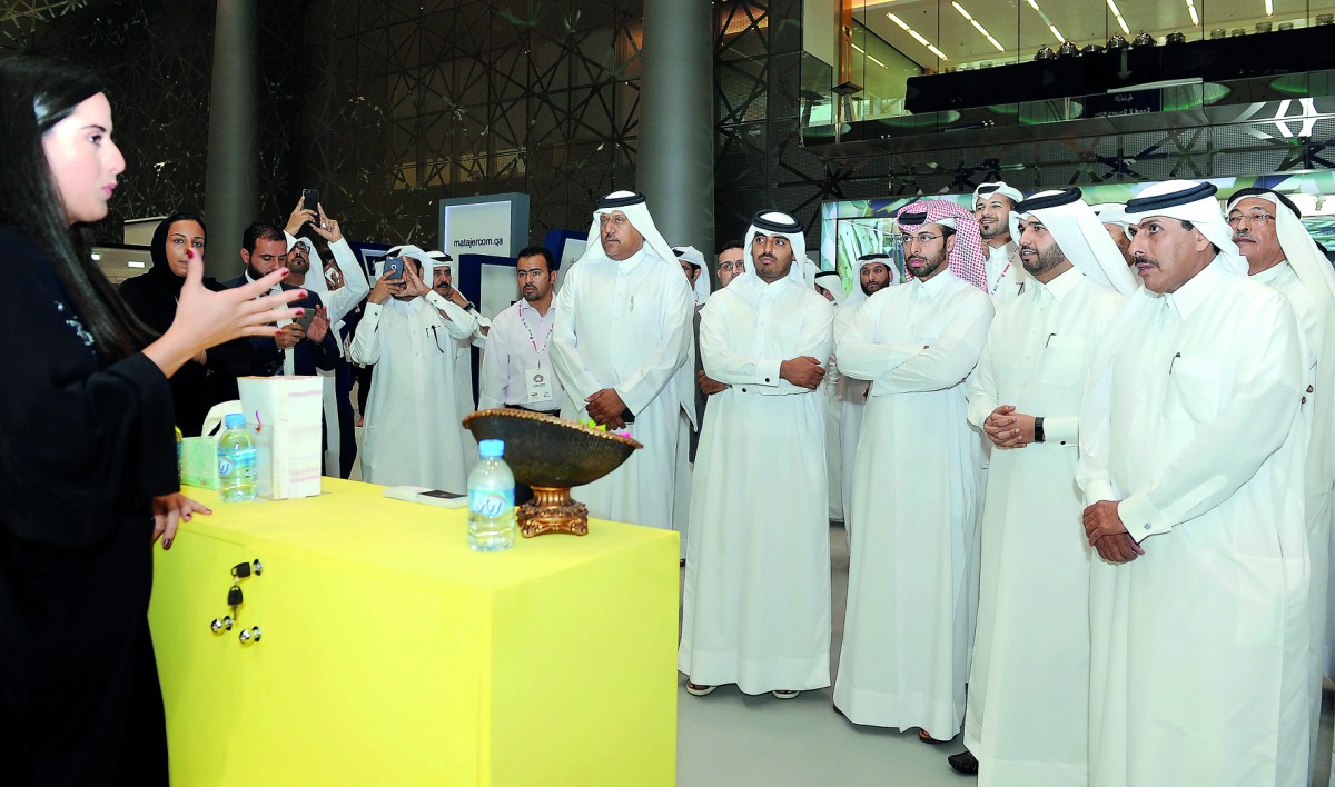 The Governor of Qatar Central Bank, H E Sheikh Abdullah Saoud Al Thani, with CEO of Qatar Development Bank (QDB), Abdulaziz bin Nasser Al Khalifa; Qatar Chamber Board Member, Ibtihaj Mohammed Al Ahmdani, and other officials, touring Made at Home exhibitio