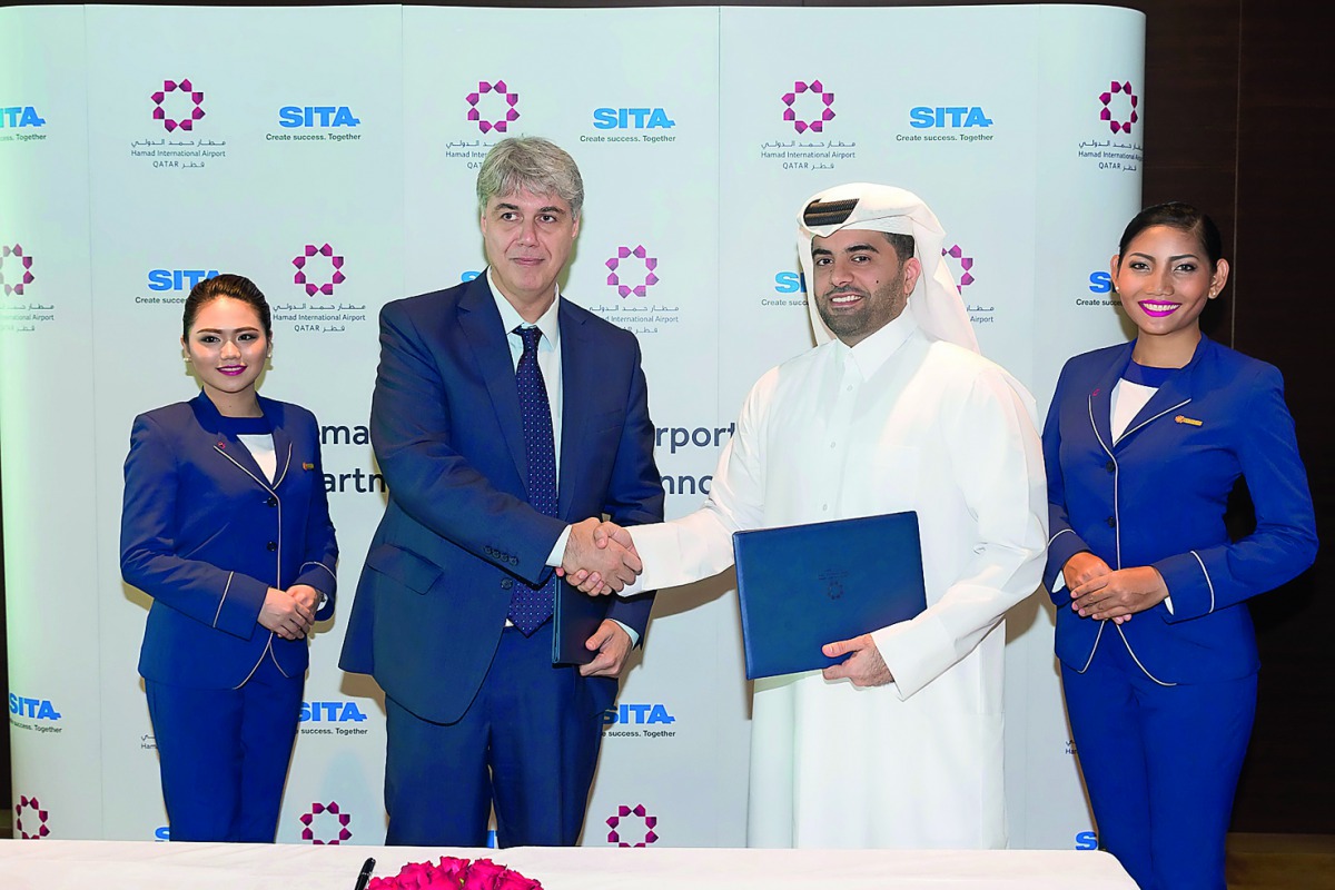 Hani El Assaad, SITA President, Middle East, India and Africa (left), and Engr Badr Mohammed Al Meer, Chief Operating Officer at Hamad International Airport, at the MoU signing ceremony.