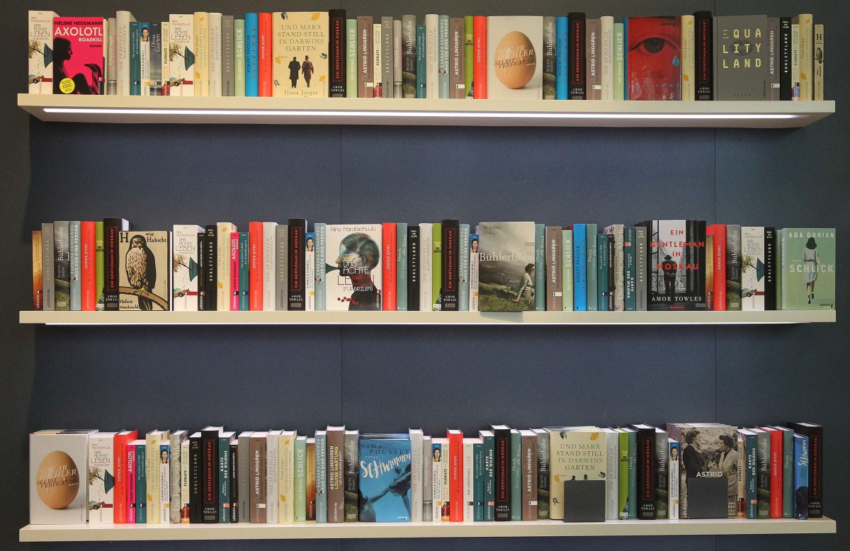 Books on shelves are pictured at the Frankfurt Book Fair 2017 in Frankfurt am Main, Germany, on October 11, 2017. The Frankfurt book fair is the world's largest publishing event, bringing together over 7,000 exhibitors from more than 100 countries. AFP / 