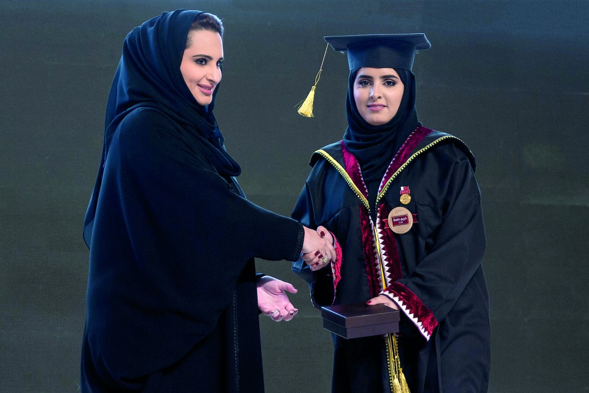 H H Sheikha Jawaher bint Hamad bin Suhaim Al Thani honouring a student of Qatar University’s (QU) women’s graduating Class of 2017, yesterday.