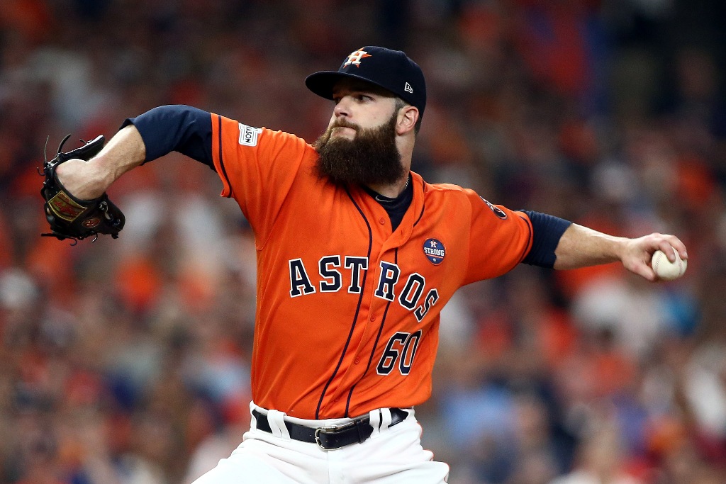 Houston Astros starting pitcher Dallas Keuchel (60) pitches during the first inning against the New York Yankees during game one of the 2017 ALCS playoff baseball series at Minute Maid Park.  Troy Taormina
