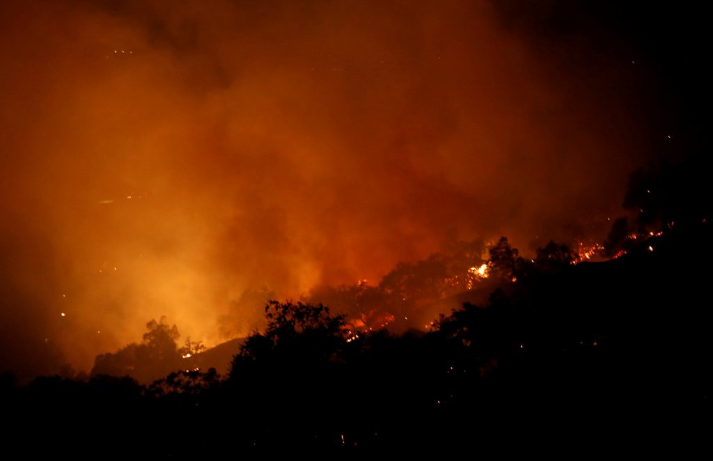 The Pocket wildfire burns in the hills above Geyserville, California, U.S., October 13, 2017. REUTERS/Jim Urquhart.