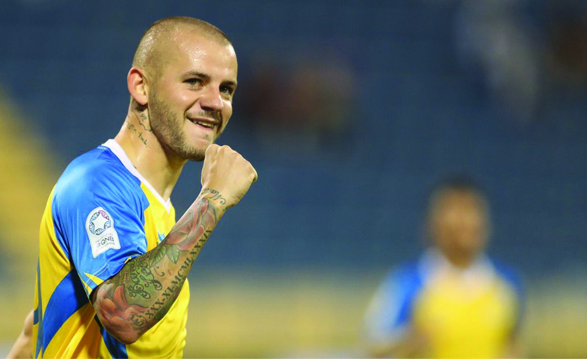 Al Gharafa’s Slovakian midfielder Vladimír Weiss celebrates after scoring his second goal against Al Khor yesterday.