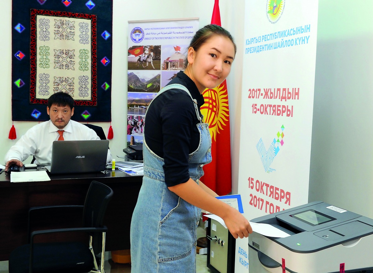 A Kyrgyz expatriate in Qatar casting vote on presidential election at the Embassy of Kyrgyz Republic in Doha, yesterday. Pic: Salim Matramkot / The Peninsula 