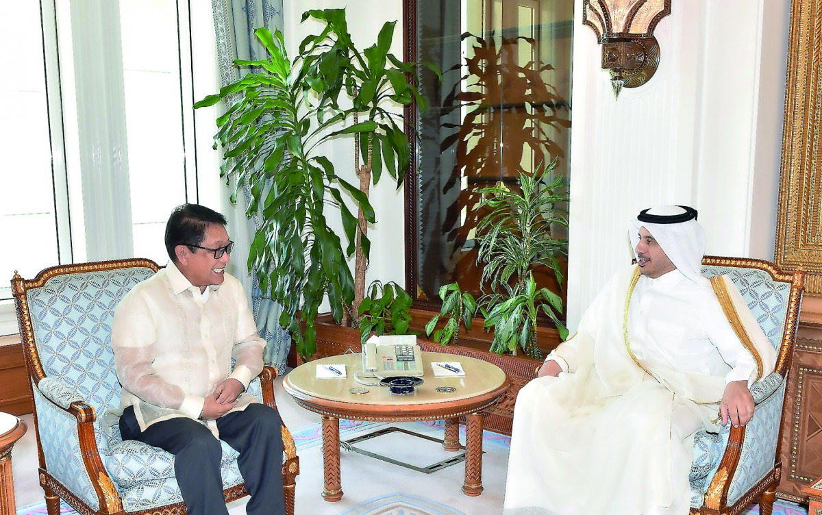 Prime Minister and Interior Minister H E Sheikh Abdullah bin Nasser bin Khalifa Al Thani with Secretary of the Department of Labour and Employment in the Philippines, Silvestre Bello, in Doha yeasterday.