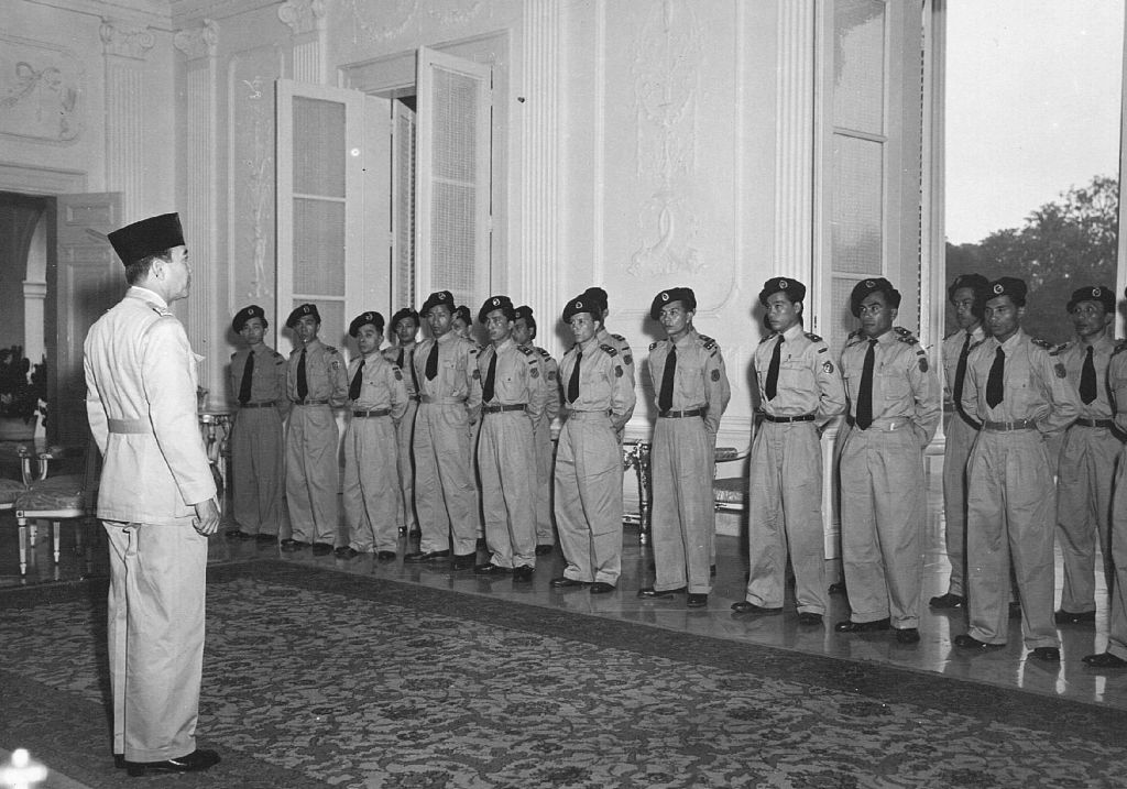 This file photo taken on March 24, 1950 shows President Sukarno receiving officers of the battalion Worang at the palace Gambir in parting. The United States government had intimate knowledge of the Indonesian army's bloody anti-communist purge in the 196