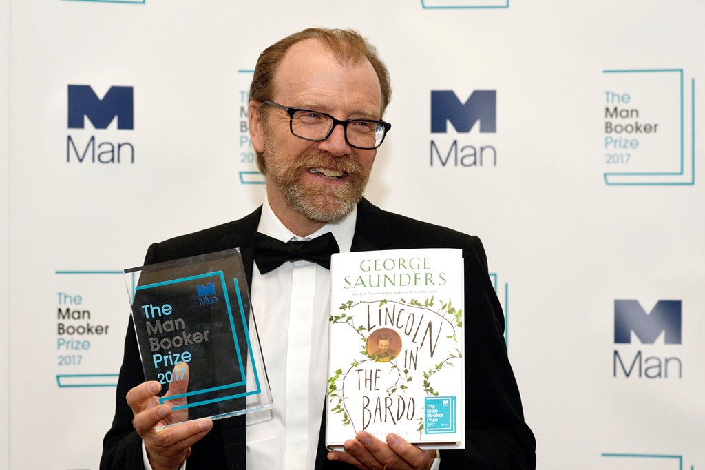George Saunders, author of 'Lincoln in the Bardo', poses for photographers after winning the Man Booker Prize for Fiction 2017 in London, Britain, October 17, 2017. Reuters/Mary Turner