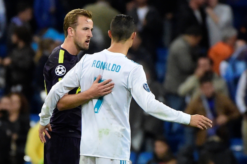 Tottenham Hotspur's English striker Harry Kane (L) greets Real Madrid's Portuguese forward Cristiano Ronaldo after the UEFA Champions League group H football match Real Madrid CF vs Tottenham Hotspur FC at the Santiago Bernabeu stadium in Madrid on Octobe