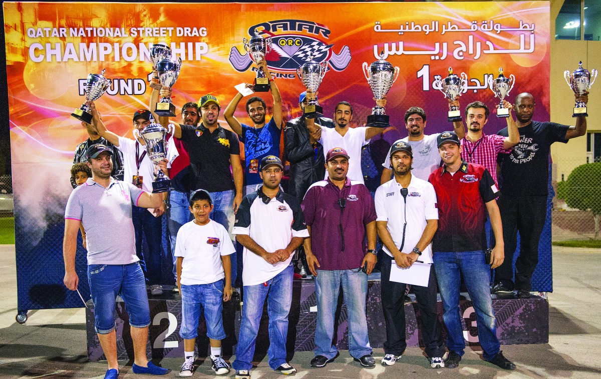 The podium winners at the first round of the Qatar National Street Drag Championship (QNSDC) pose for a picture at Qatar Racing Club in this file picture. The first round of this year’s QNSDC begins on October 26.