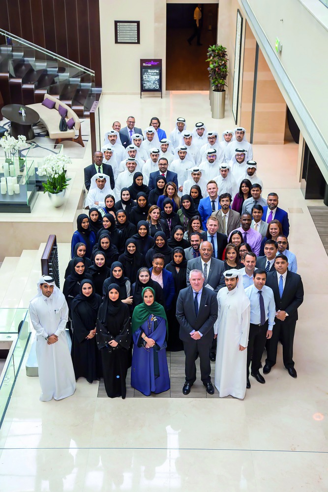 Newly joined nationals pose for a group picture.