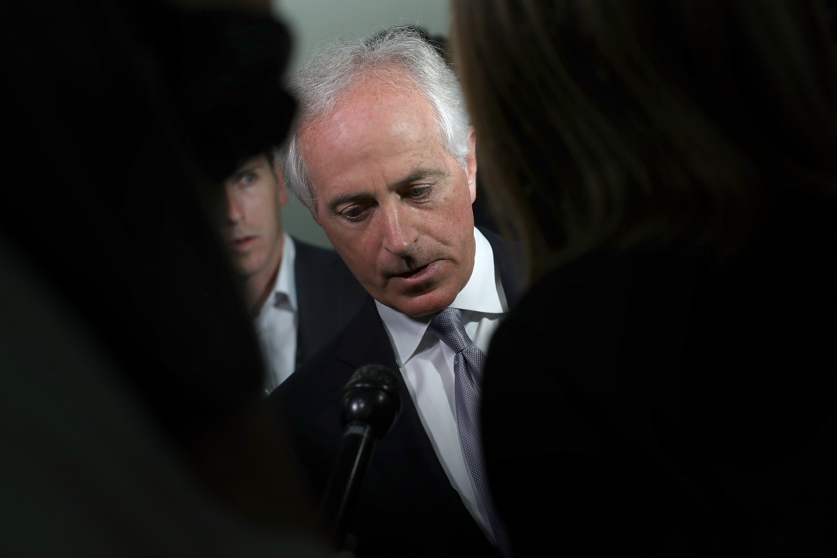 Sen. Bob Corker (R-TN) speaks to members of the press on Capitol Hill about U.S. President Donald Trump October 24, 2017 in Washington, DC.  Win McNamee/Getty Images/AFP