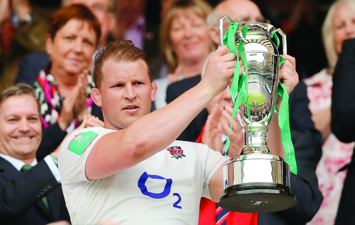 England’s Dylan Hartley celebrates with the Old Mutual Wealth Cup after the game at Twickenham Stadium, London in this May 2016 file picture.