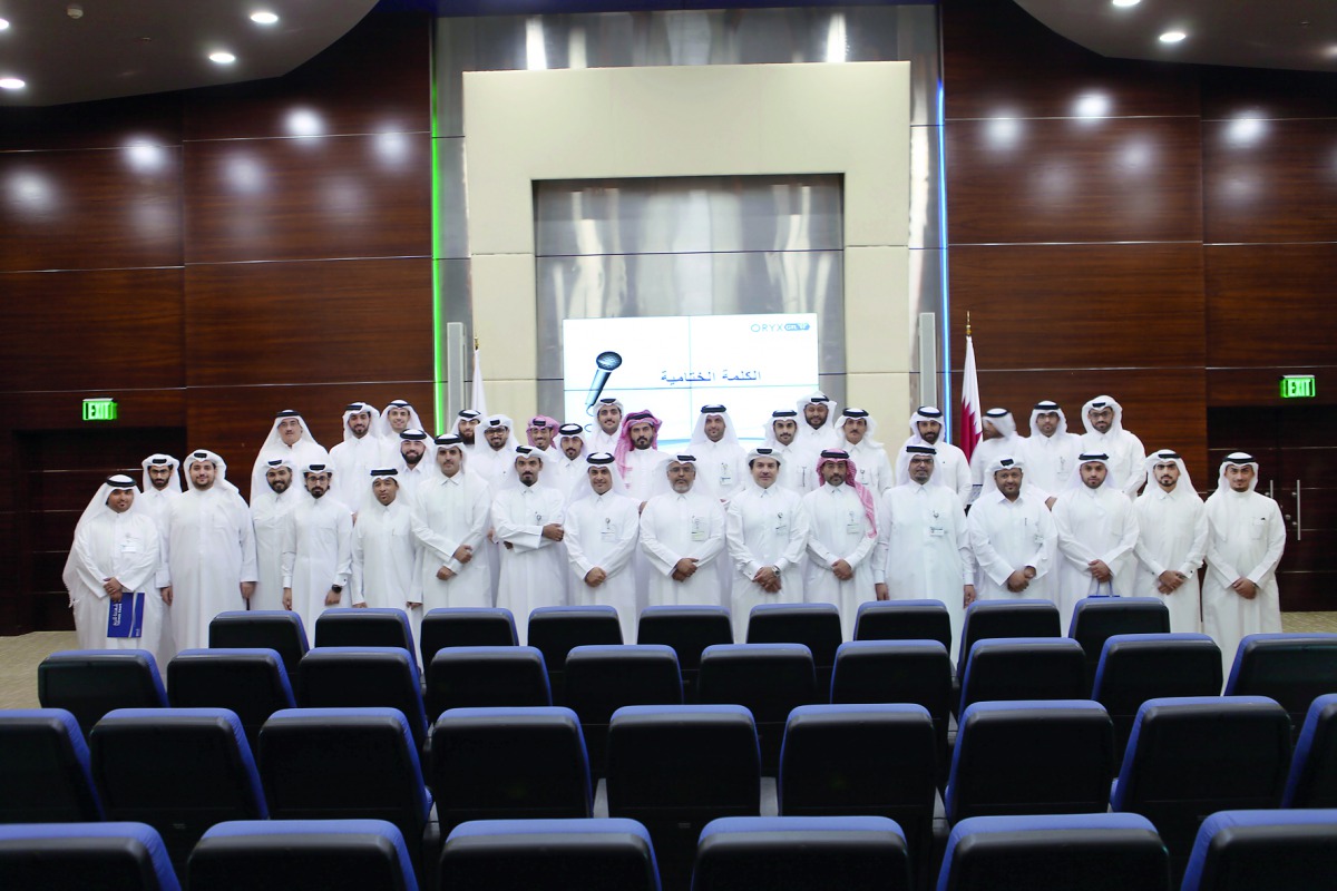 Qatari employees at the Oryx GTL during the annual Qatari Day .