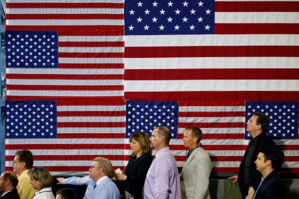 A file photo of people listening as US President Donald Trump speaks about tax reform in Harrisburg, Pennsylvania, U.S., October 11, 2017. Reuters/Joshua Roberts 