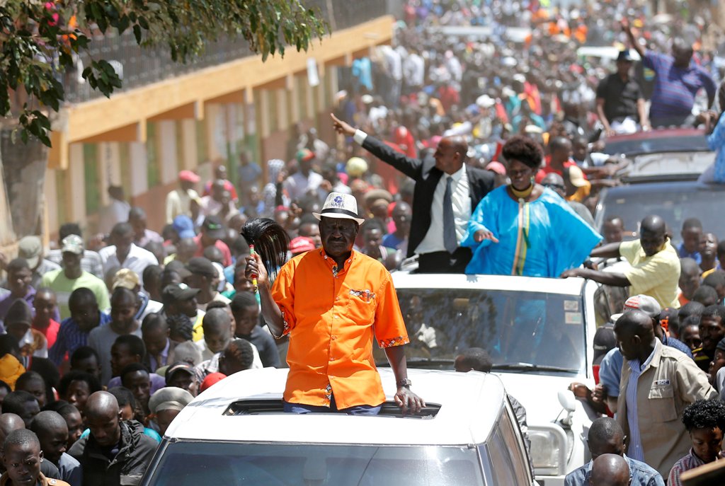 Kenyan opposition leader Raila Odinga of the National Super Alliance (NASA) coalition greets his supporters in Nairobi, Kenya October 29, 2017. REUTERS/Thomas Mukoya