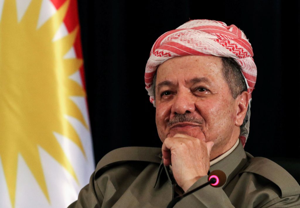 (FILES) This file photo taken on September 24, 2017 shows Iraqi Kurdish leader Massud Barzani, seated next to a Kurdish flag, during a press conference in Arbil, the capital of the autonomous Kurdish region of northern Iraq.  AFP / SAFIN HAMED

