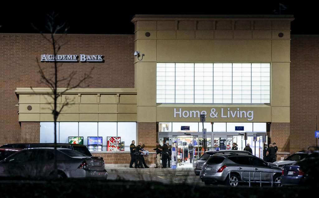 Police investigate the scene of a shooting at a Wal Mart store in the Thorton Town Center shopping plaza on November 1, 2017 in Thornton, Colorado. According to reports, two people were killed and one was injured. Marc Piscotty/Getty Images/AFP