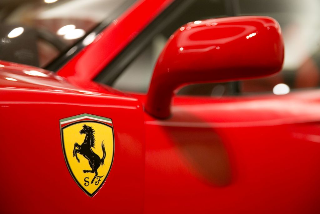 (FILES) This file photo taken on August 12, 2016 shows the Ferrari logo on a 1990 Ferrari F40.   AFP / Daniel LEAL-OLIVAS
