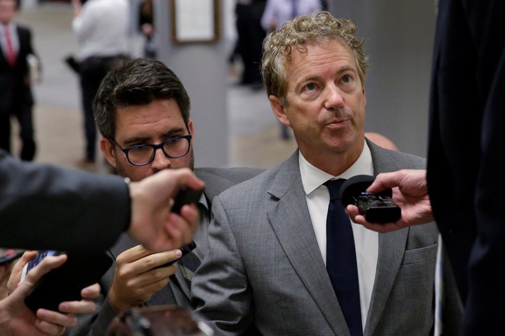 FILE PHOTO: Senator Rand Paul (R-KY) speaks to reporters as he arrives for a vote on Capitol Hill in Washington, US, October 18, 2017. / Reuters. 