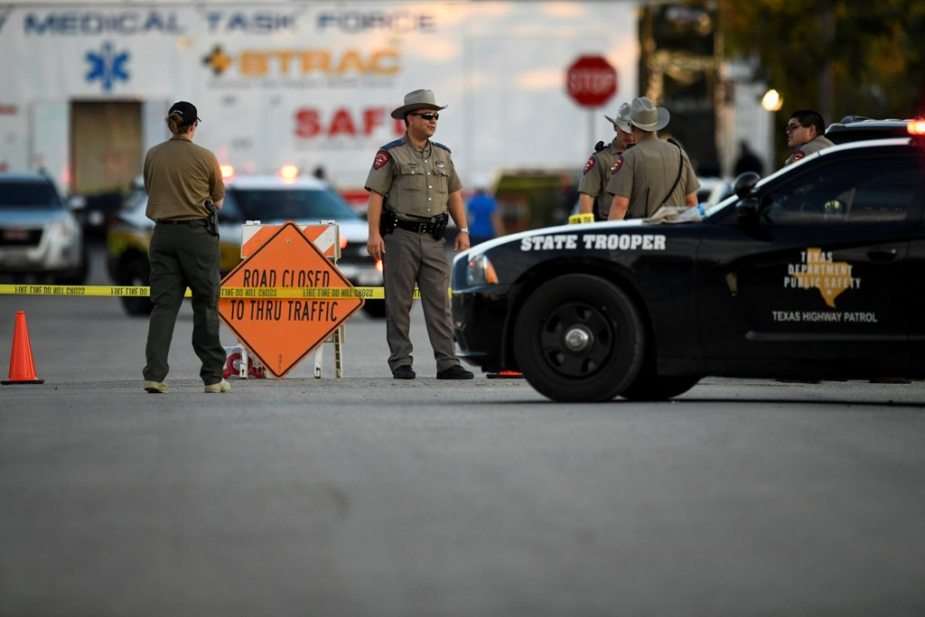 Law enforcement officials set up along a street near the First Baptist Church after a mass shooting in Sutherland Springs, Texas, US., November 5, 2017. REUTERS/Mohammad Khursheed