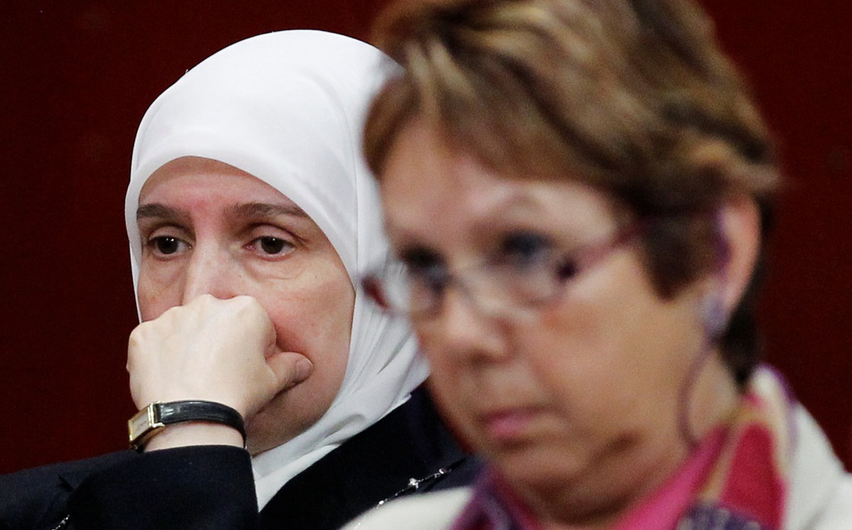 FILE PHOTO: Women look on during the National Assembly committee hearings on Bill 94 in Quebec City May 19, 2010. Bill 94 is a legislation which would predominantly affect women who wear the Islamic niqab or burka, and would require public employees, educ