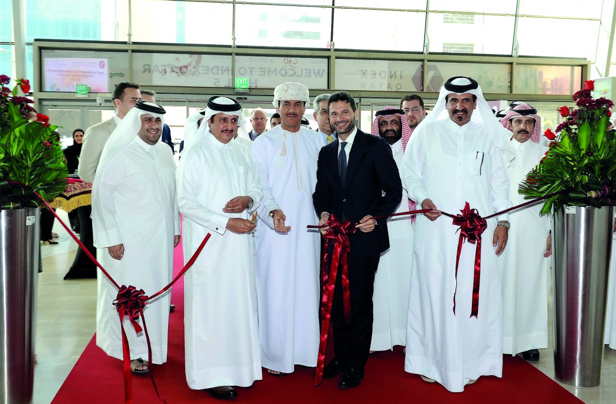 Chairman of Qatar Chamber, Sheikh Khalifa bin Jassim bin Mohammed Al Thani, inaugurating the Index Qatar, in the presence of Hassan Al Ibrahim, Chief Tourism Development Officer of QTA; Mohamed bin Ahmed bin Towar Al Kuwari, Vice-Chairman, Qatar Chamber;