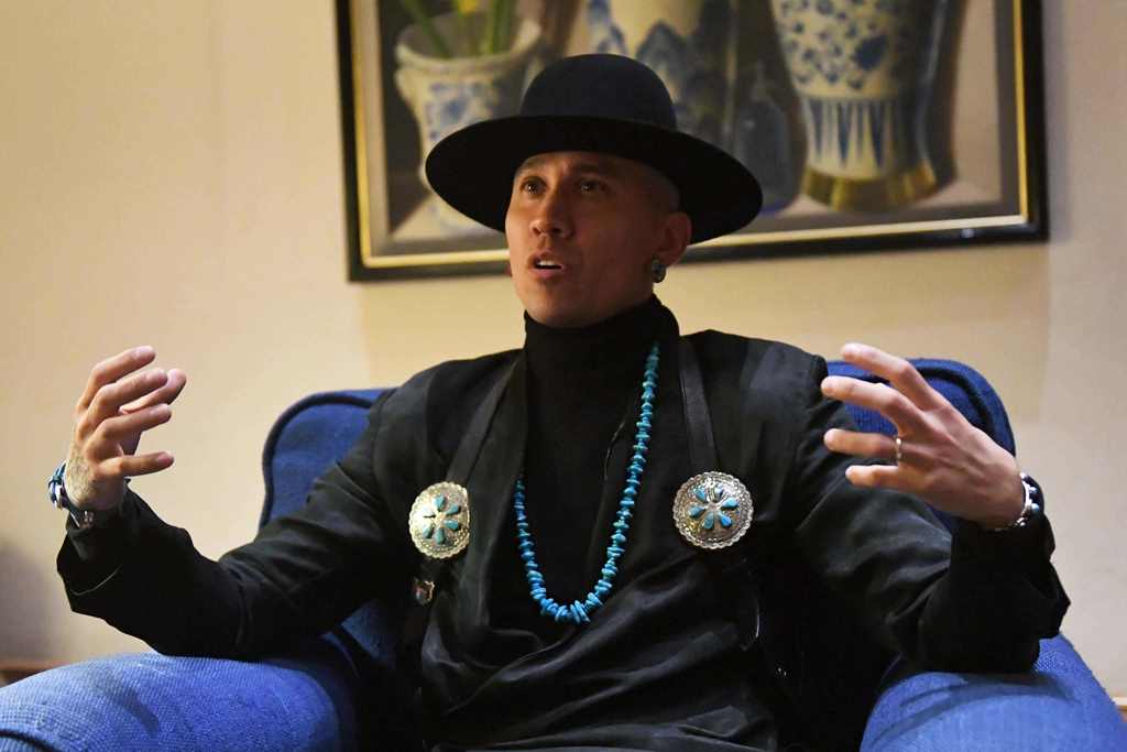 Jaime Luis Gomez, aka Taboo of the Black Eyed Peas, and a cancer survivor, speaks during an interview with AFP on the eve of the World Cancer Leaders' Summit in Mexico City, on November 13, 2017. / AFP / PEDRO PARDO