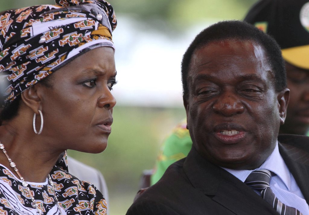 FILE PHOTO: President Robert Mugabe's wife Grace Mubage and vice-President Emmerson Mnangagwa attend a gathering of the ZANU-PF party's top decision-making body, the Politburo, in the capital Harare, Zimbabwe, February 10, 2016. REUTERS/Philimon Bulawayo/