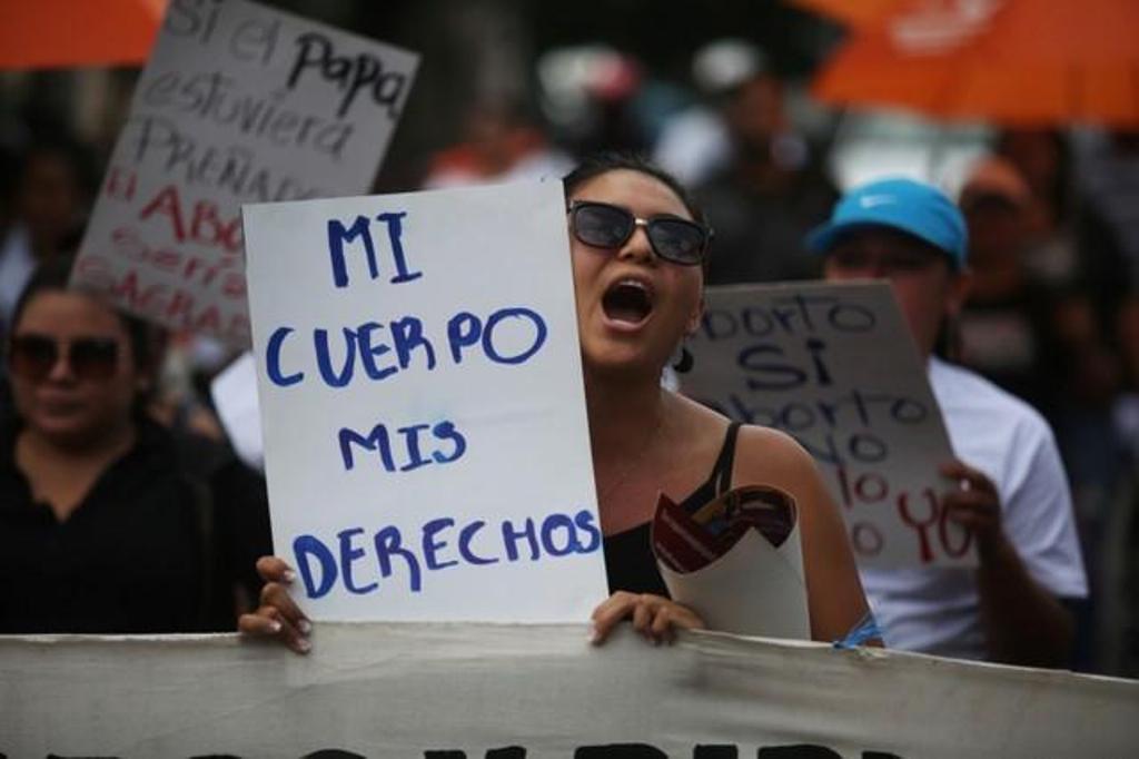 A file photo of women participating in a demonstration to ask for decriminalization of abortion in San Salvador, El Salvador, September 28, 2017. The writing on the placard reads, 