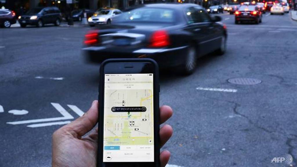 Attitudes to vehicle ownership in cities are changing as smartphone apps make a ride available in minutes AFP/Andrew Caballero-Reynolds.