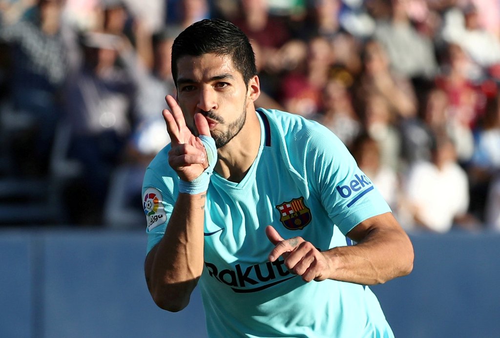 Barcelona’s Luis Suarez celebrates scoring their first goal REUTERS/Juan Medina
