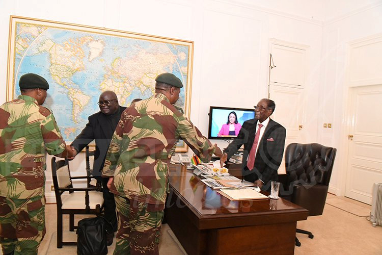 President Robert Mugabe meets with General Constantino Chiwenga and senior members of the Zimbabwe Defence Forces at State House in Harare, Zimbabwe November 19, 2017. Zimpapers/Joseph Nyadzayo/handout via Reuters