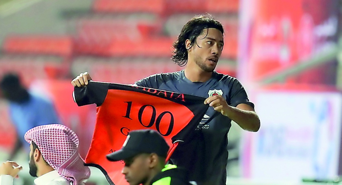 Al Rayyan striker Rodrigo Tabata celebrates after scoring his 100th goal in Qatar.
