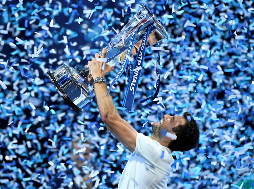 Bulgaria's Grigor Dimitrov celebrates with the trophy after winning the final against Belgium's David Goffin Action Images via Reuters/Tony O'Brien
