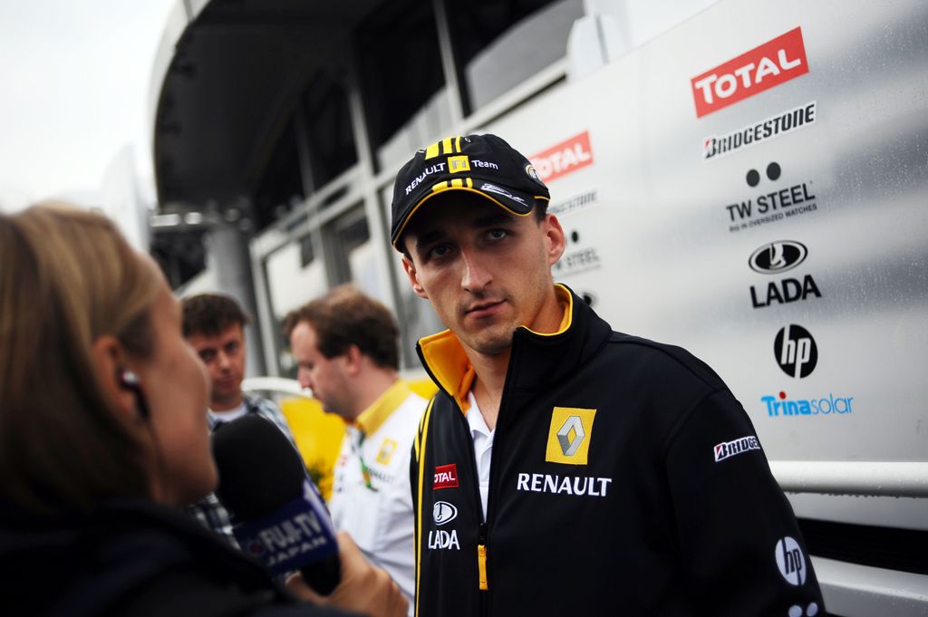 (FILES) This file photo taken on July 23, 2010 shows Renault F1's Polish driver Robert Kubica addressing journalists in the paddock of the Hockenheimring circuit in Hockenheim, southwestern Germany, during the second free practice session of the Formula O