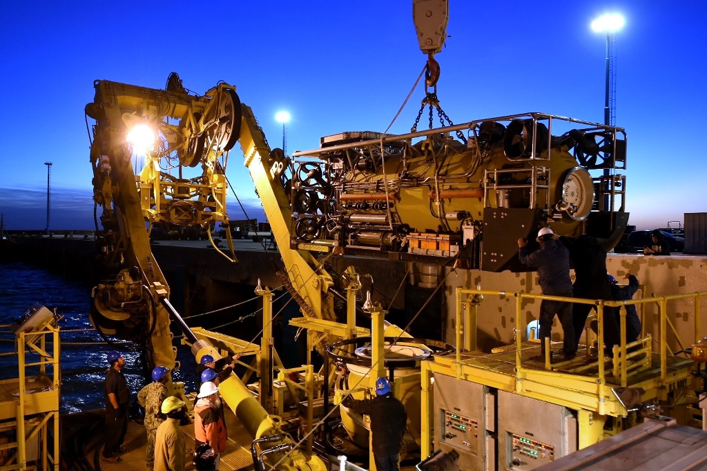 This handout picture released by U.S. Navy shows Undersea Rescue Command (URC) and Argentine construction workers preparing the motor vessel Sophie Siem for the installation of the Submarine Rescue Diving and Recompression System (SRDRS) which operates th
