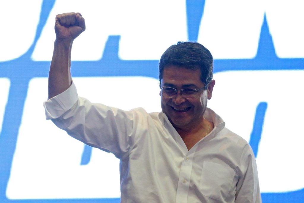 Honduras President and National Party candidate Juan Orlando Hernandez celebrates with supporters as he cites exit polls to declare himself winner in the presidential election in Tegucigalpa, Honduras, November 26, 2017. REUTERS/Edgard Garrido
