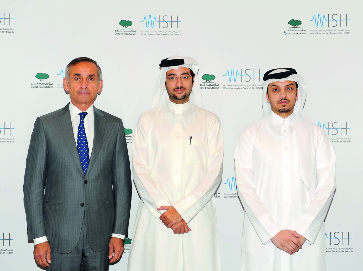 FROM LEFT: Prof. Lord Darzi of Denham, Executive Chair, WISH; with Omran Hamad Al Kuwari, Executive Director, CEO Office, QF; and Khalifa Al Kubaisi, Head of Press Office, QF; after a media briefing on WISH 2018 at the WISH headquarters at the Education C