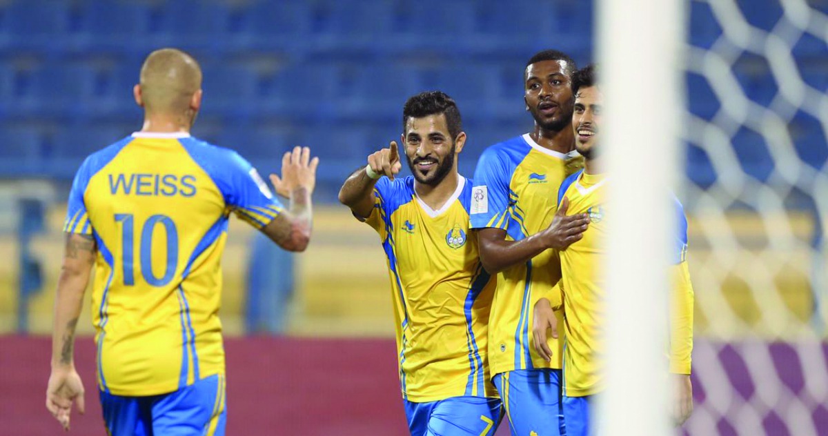 Al Gharafa players celebrate after scoring a goal during their QNB Stars League match in this file photo.