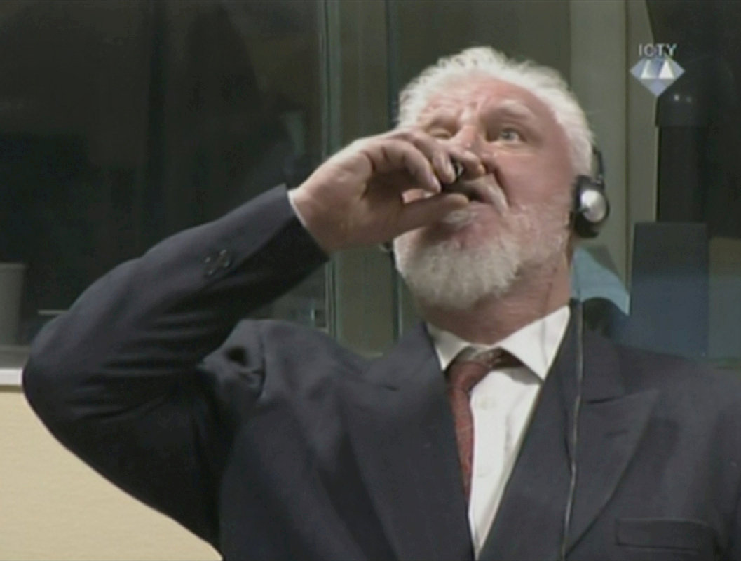 A wartime commander of Bosnian Croat forces, Slobodan Praljak, is seen during a hearing at the U.N. war crimes tribunal in the Hague, Netherlands, November 29, 2017. ICTY via Reuters TV