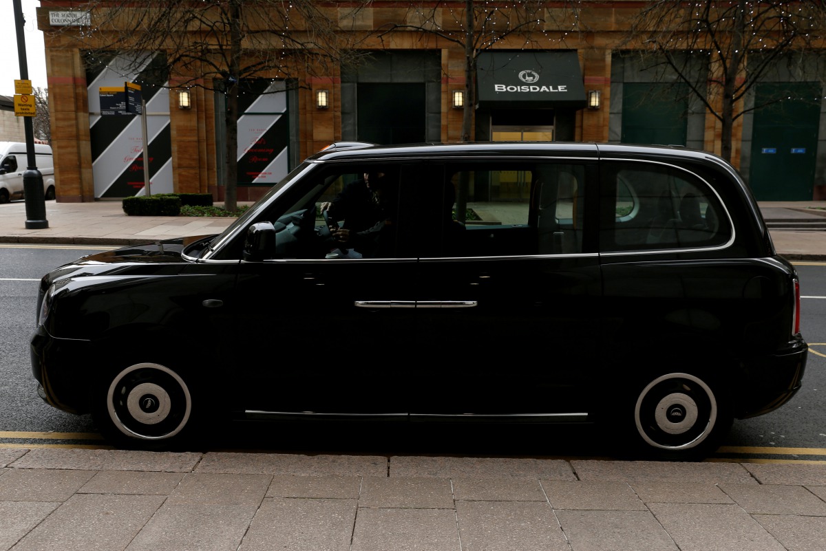 FILE PHOTO: An electric cab belonging to the London Electric Vehicle Company (LEVC) is seen in London, Britain, November 29, 2017. REUTERS/Darrin Zammit Lupi/File Photo
